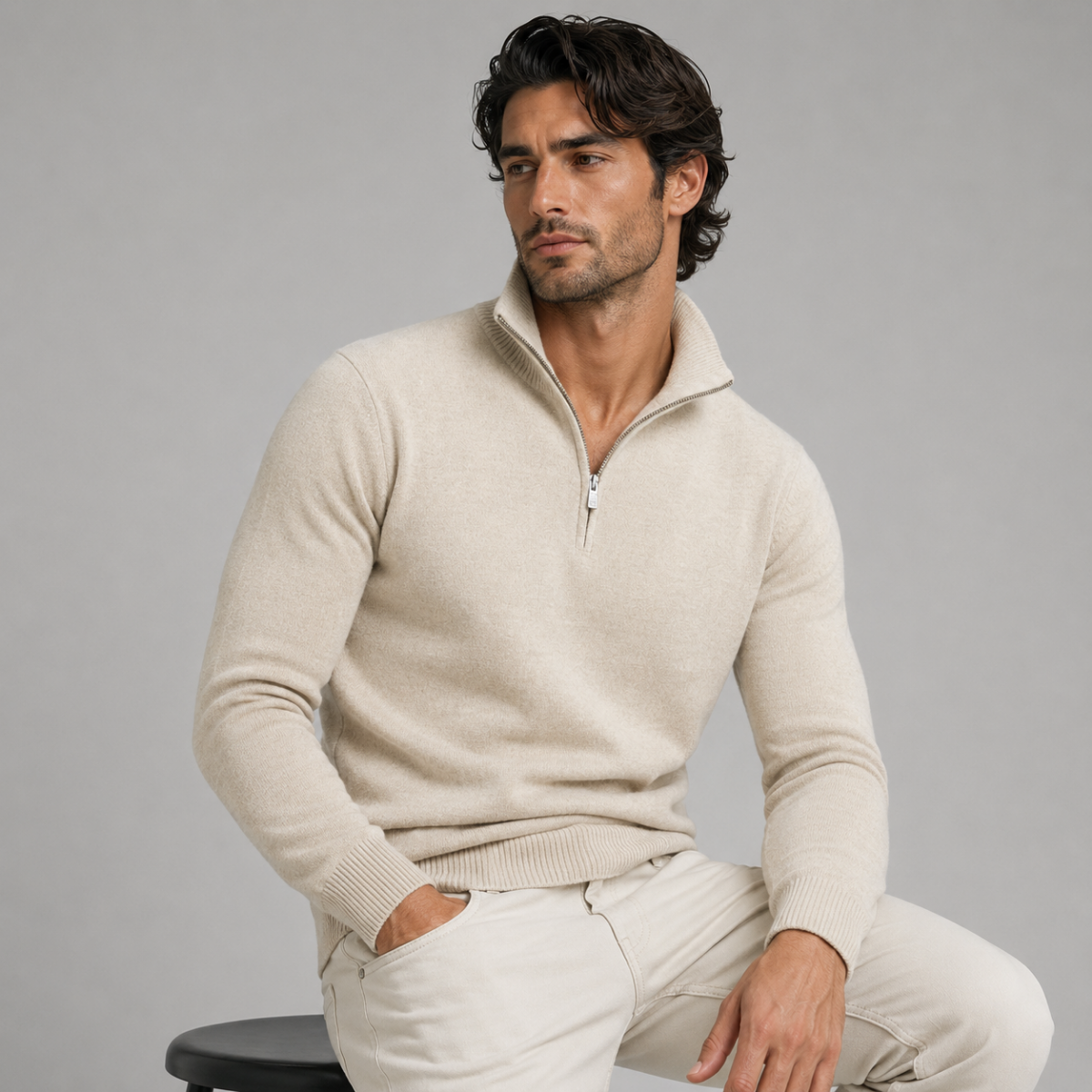 Men's light beige quarter-zip knit sweater on model