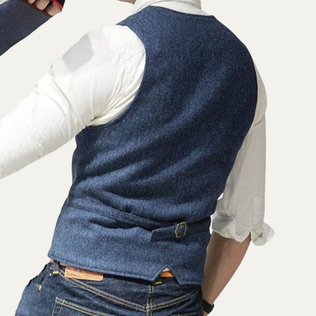 Men's dark blue textured vest with V-neck and front buttons, close-up view