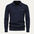 Men's navy diamond-knit polo sweater with ribbed collar and button placket