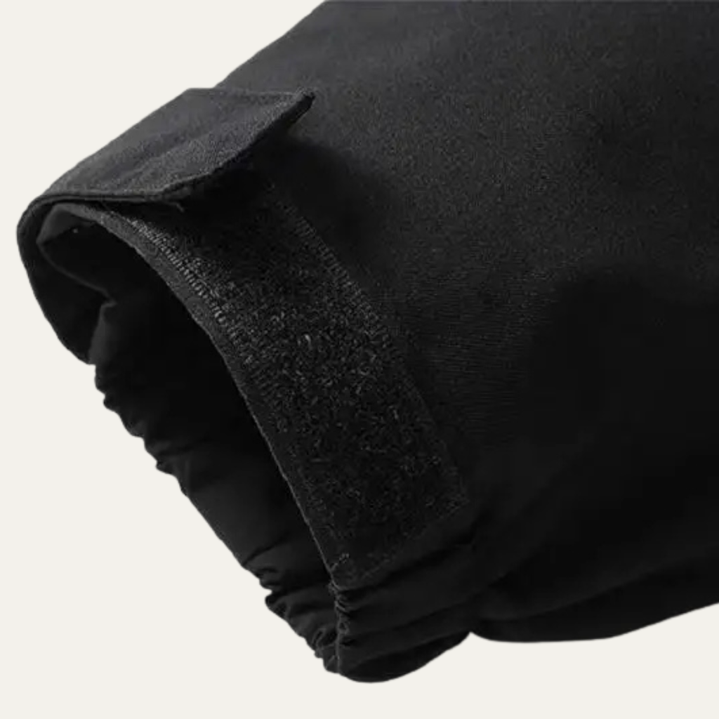 Black waterproof rain jacket cuff with elastic inner lining