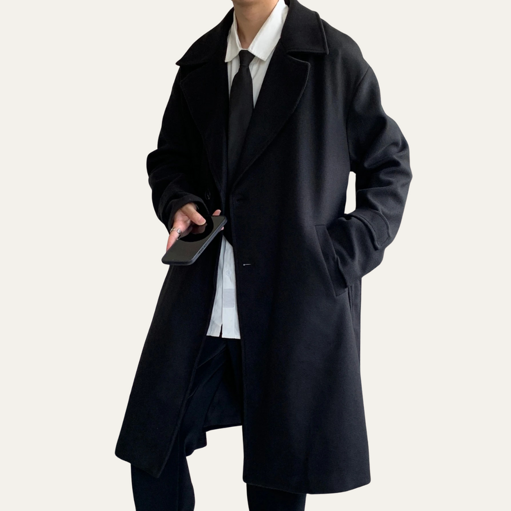 Black wool overcoat with notch lapels and long sleeves, button front