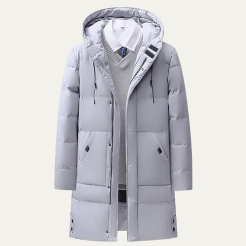 Light gray long hooded puffer jacket with quilted panels, front zipper, and flap pockets