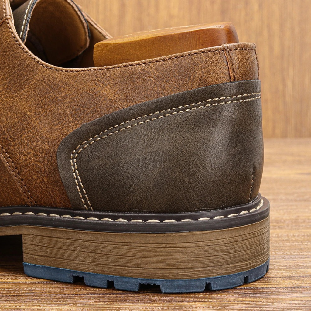 Leather oxford shoe heel with stitched panel and blue rubber outsole