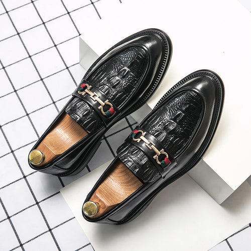 Black embossed leather loafers with metal buckle and green-red stripe accents