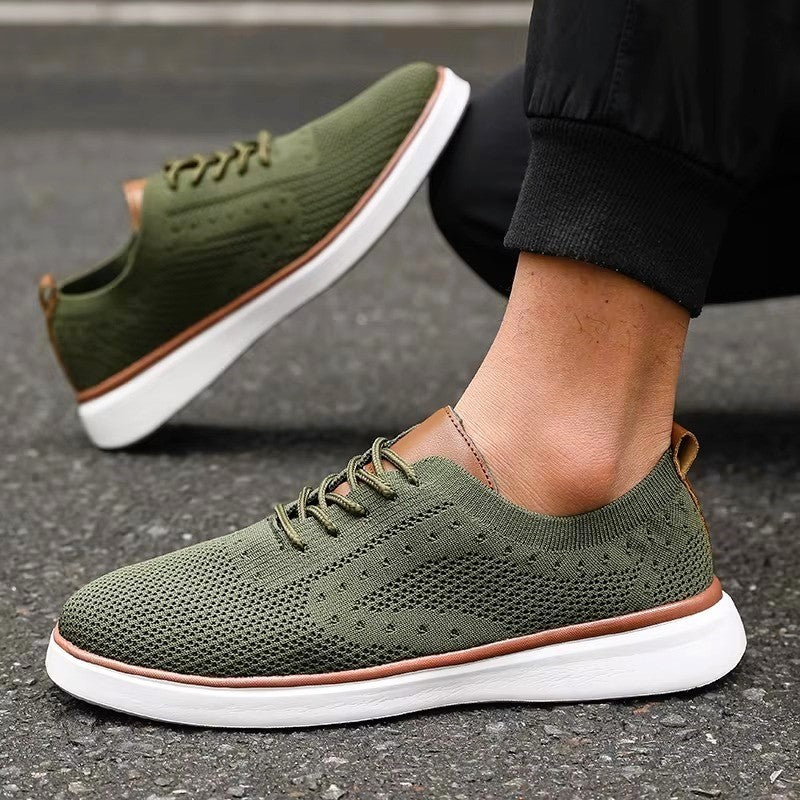 Green lace-up mesh sneakers with white sole and brown trim