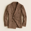 Brown houndstooth blazer with peak lapels and double-breasted button closure
