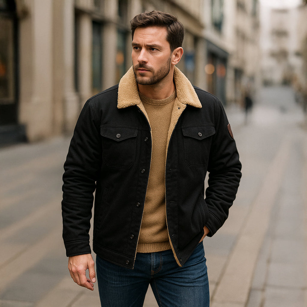 Men's winter coat in black with tan sherpa lining and snap chest pockets