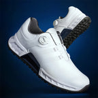 White lace-up golf shoe with textured rubber tread sole and dark heel support panel