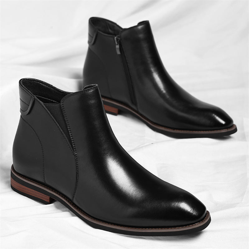 Pair of Lorenzo Vitali Chelsea-style boots in black leather with elastic sides, low heel