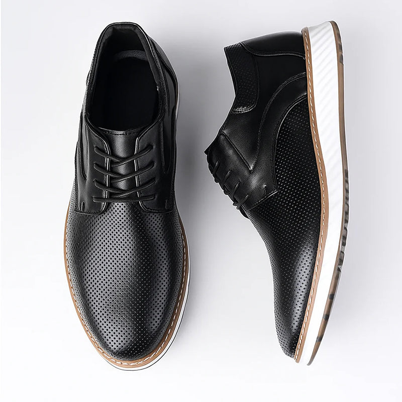 Black lace-up oxford shoes with perforated finish, white sole, pair view