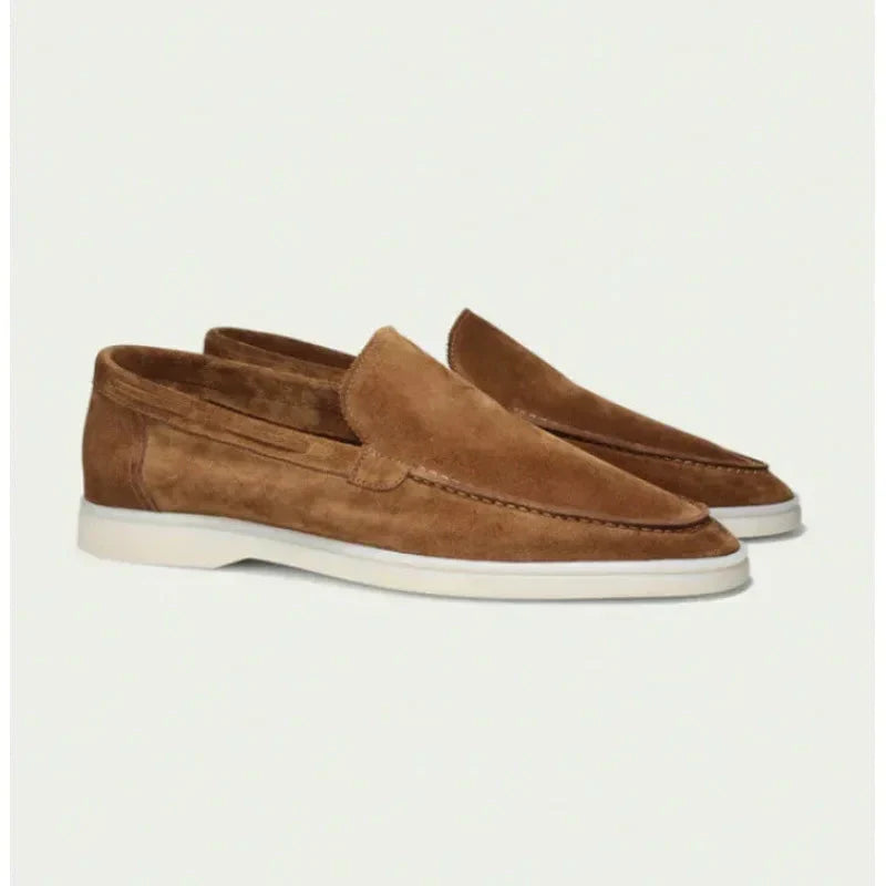 Men's caramel-brown suede slip-on loafers with moc toe seam and white sole