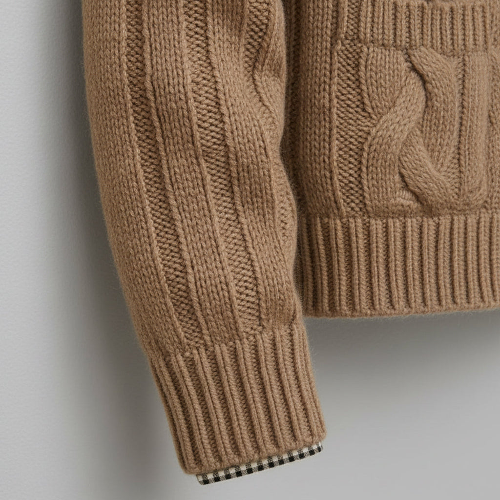 Men’s beige knitted cardigan sleeve cuff with cable knit texture and ribbed hem