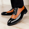 Ostrich dress shoes with gloss finish, tan uppers with black strap buckle and wingtip trim