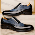 Ostrich dress shoes with gloss finish, blue uppers with black toe panels and strap buckle