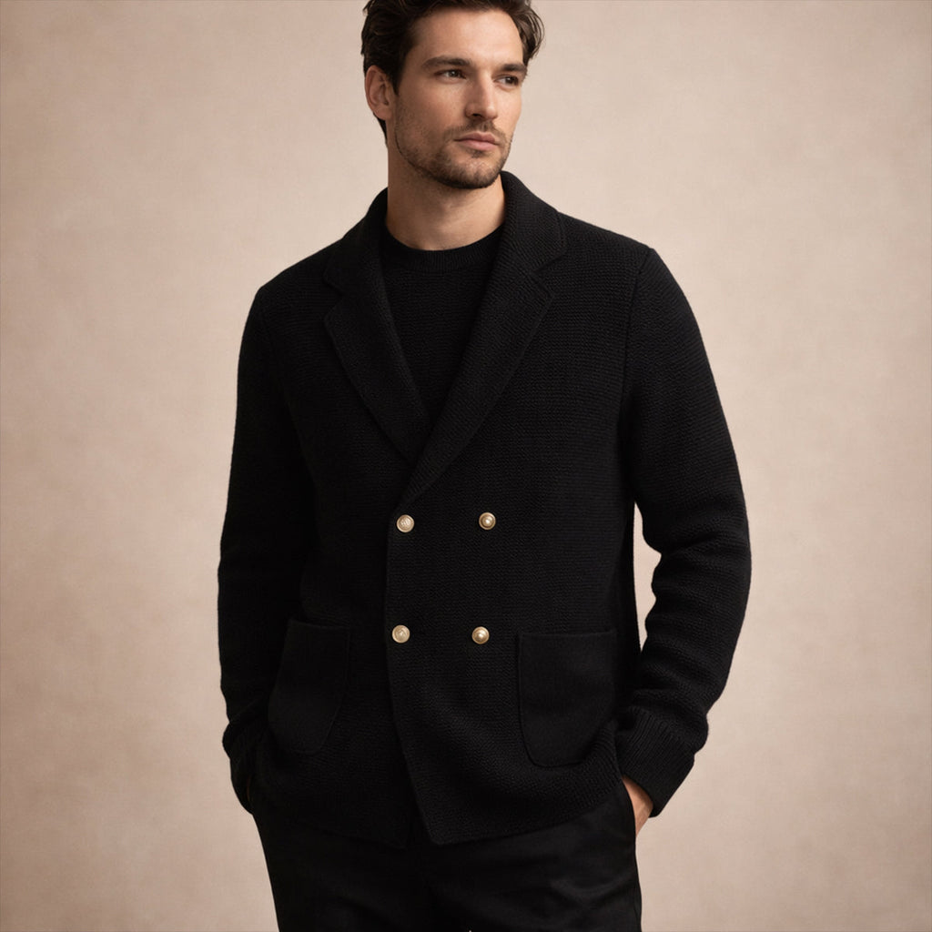 Men's black double-breasted knit cardigan on model, with gold buttons and patch pockets