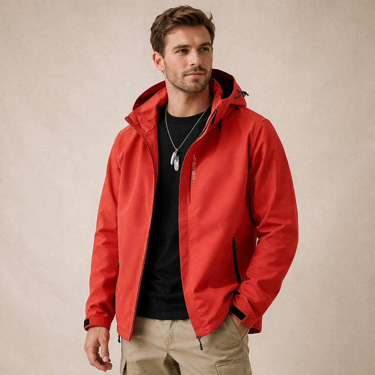 Red hooded waterproof softshell rain jacket with front zip and drawcord hem