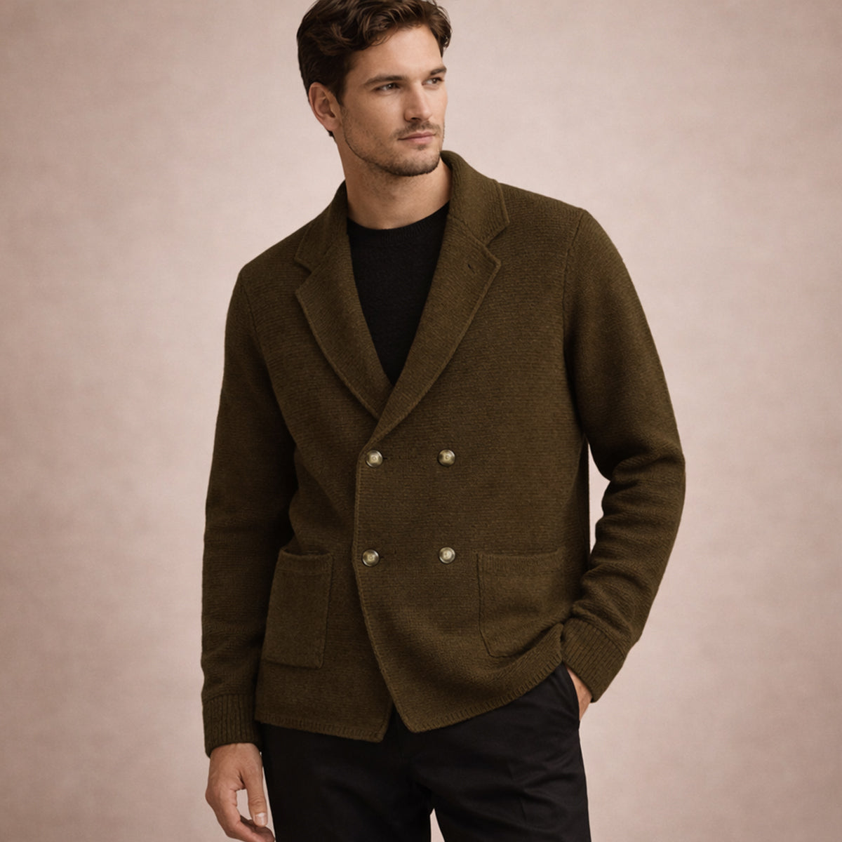 Men's brown double-breasted knit cardigan on model, with gold buttons and patch pockets