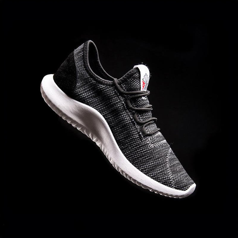 Black knit AirLight sneakers with lace-up closure and white rubber sole