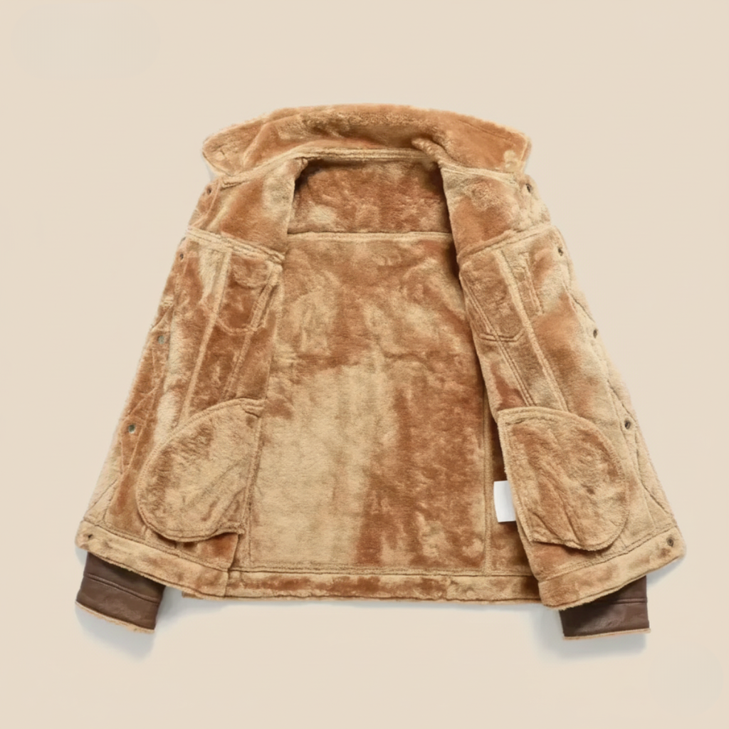 Tan suede sherpa-lined jacket detail: sherpa collar and quilted lining on the inside