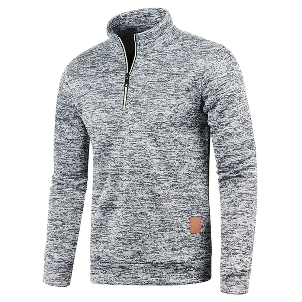Men's heather gray half-zip fleece pullover with stand collar and long sleeves, tan patch