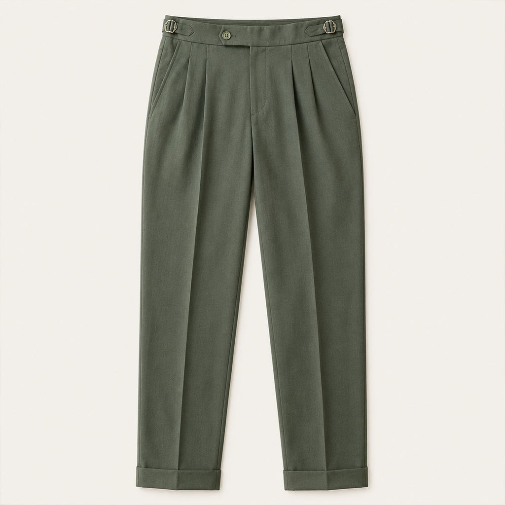 Dark green high-waist double-pleated pants with belt loops and button closure, cuffed hem.