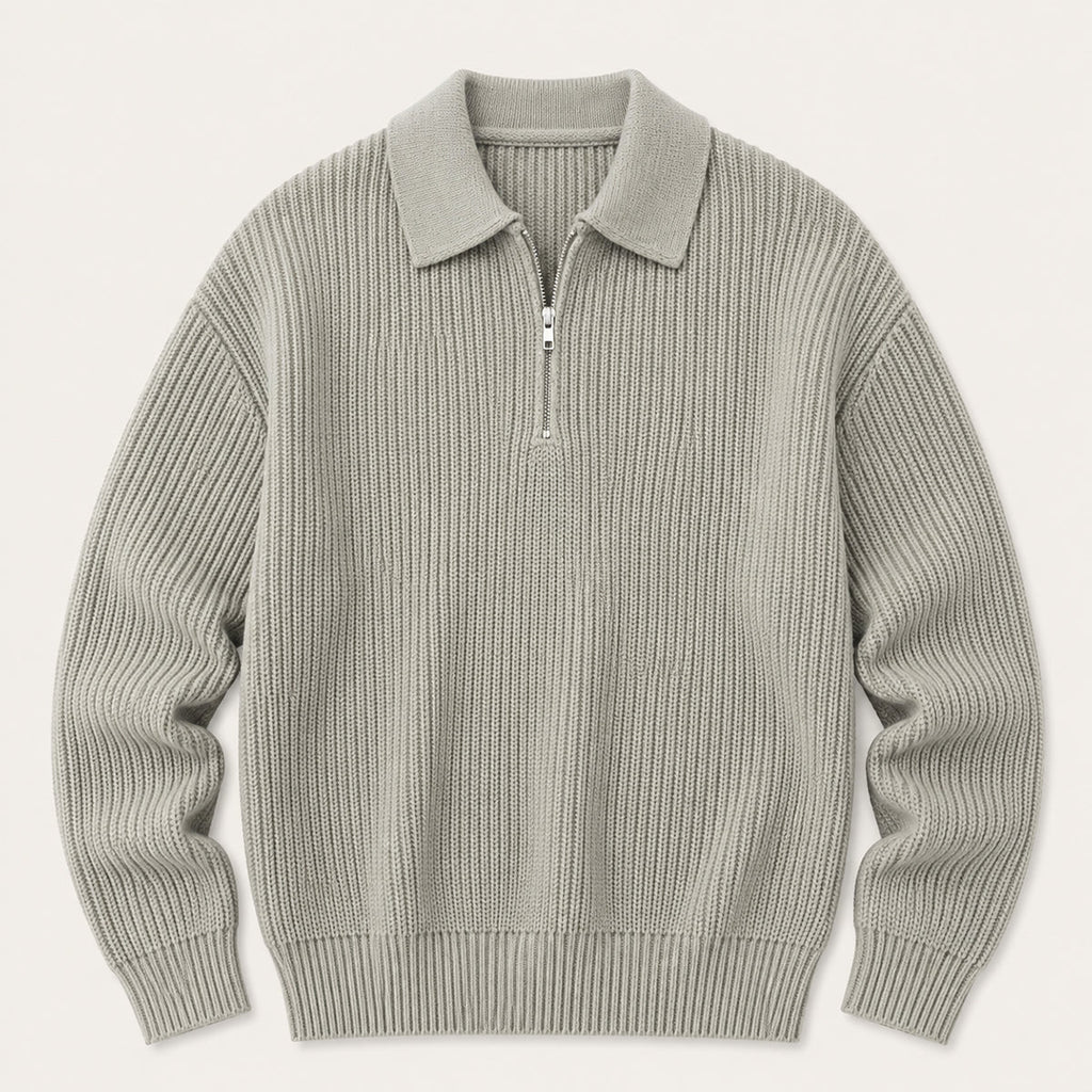 Light gray men’s half-zip knit sweater with ribbed stand collar and zipper.