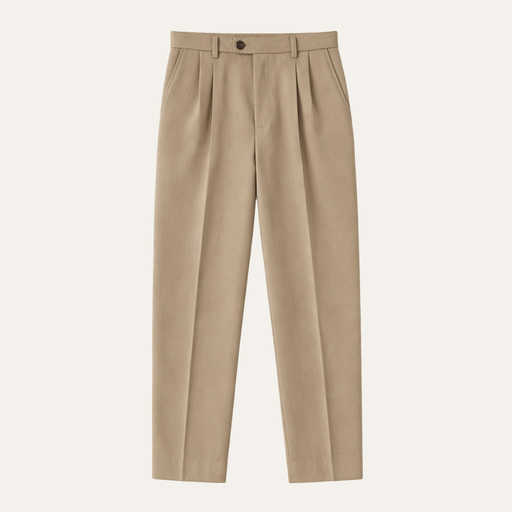 Men's beige pleated tailored pants with belt loops and button closure.