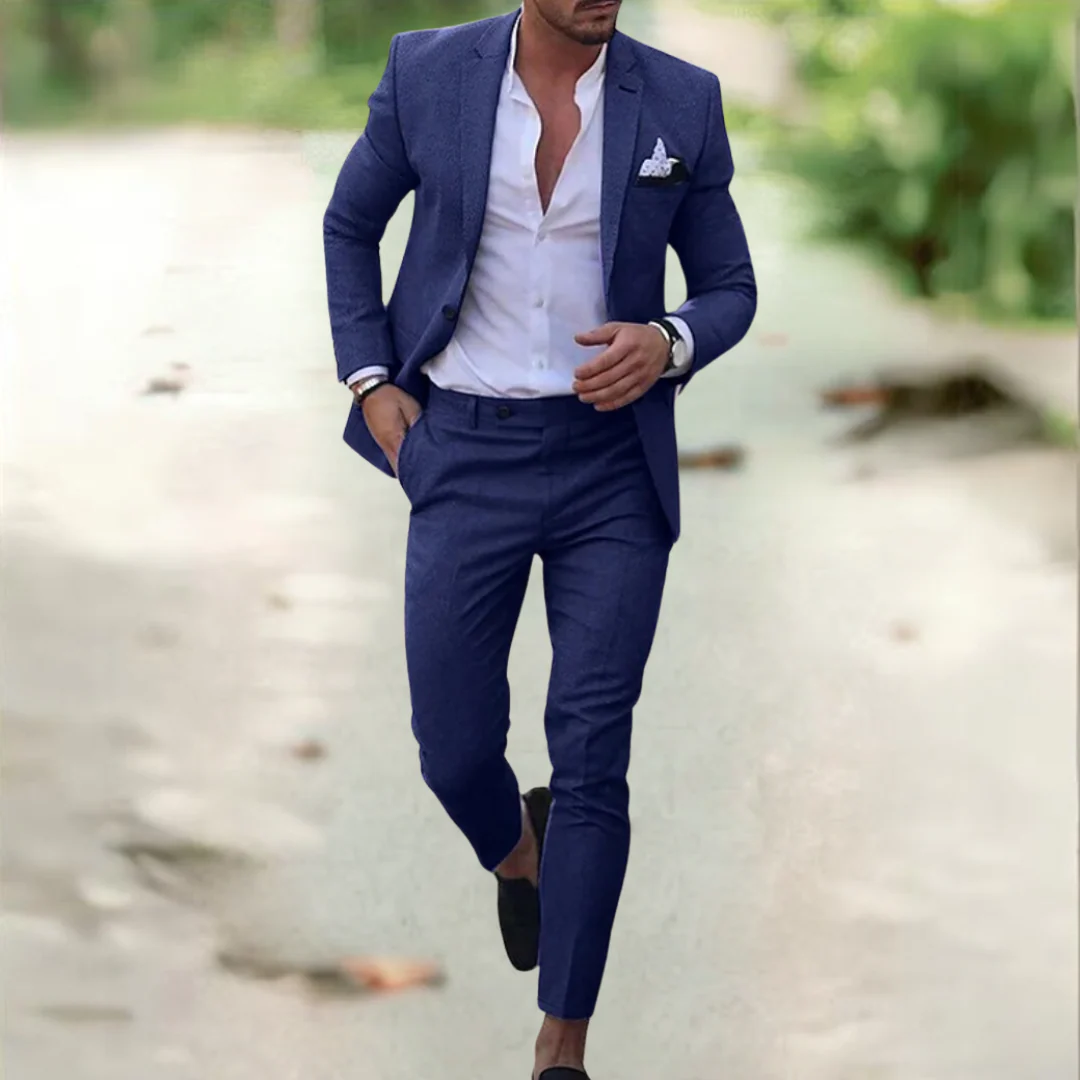 Men's navy linen suit on-model with blazer, vest, and matching trousers