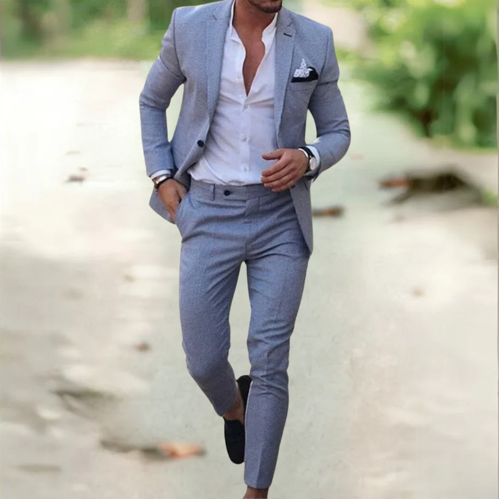 Men's sky blue linen suit on-model with blazer, vest, and matching trousers
