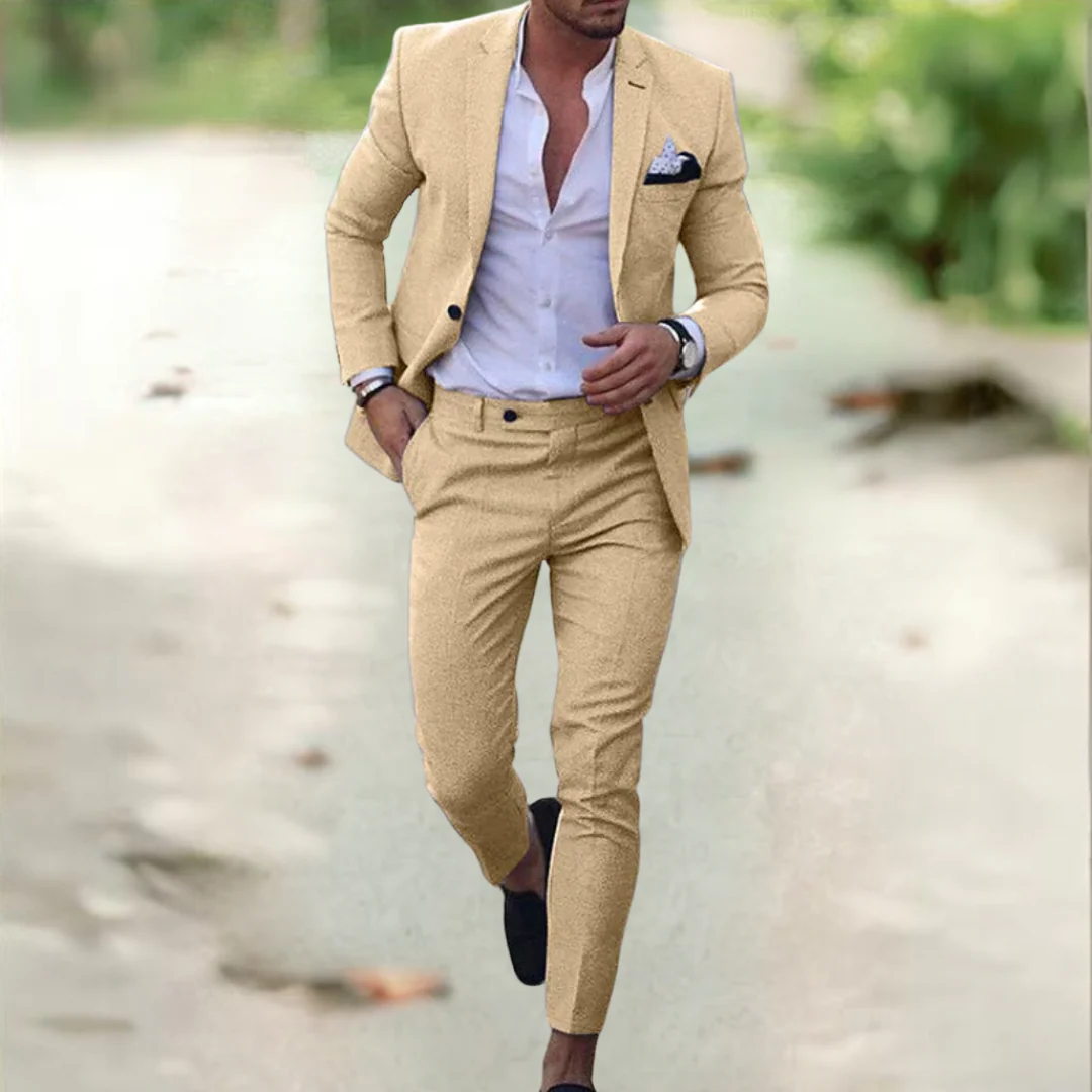 Khaki linen suit on model with light blue shirt, blazer, trousers, pocket square