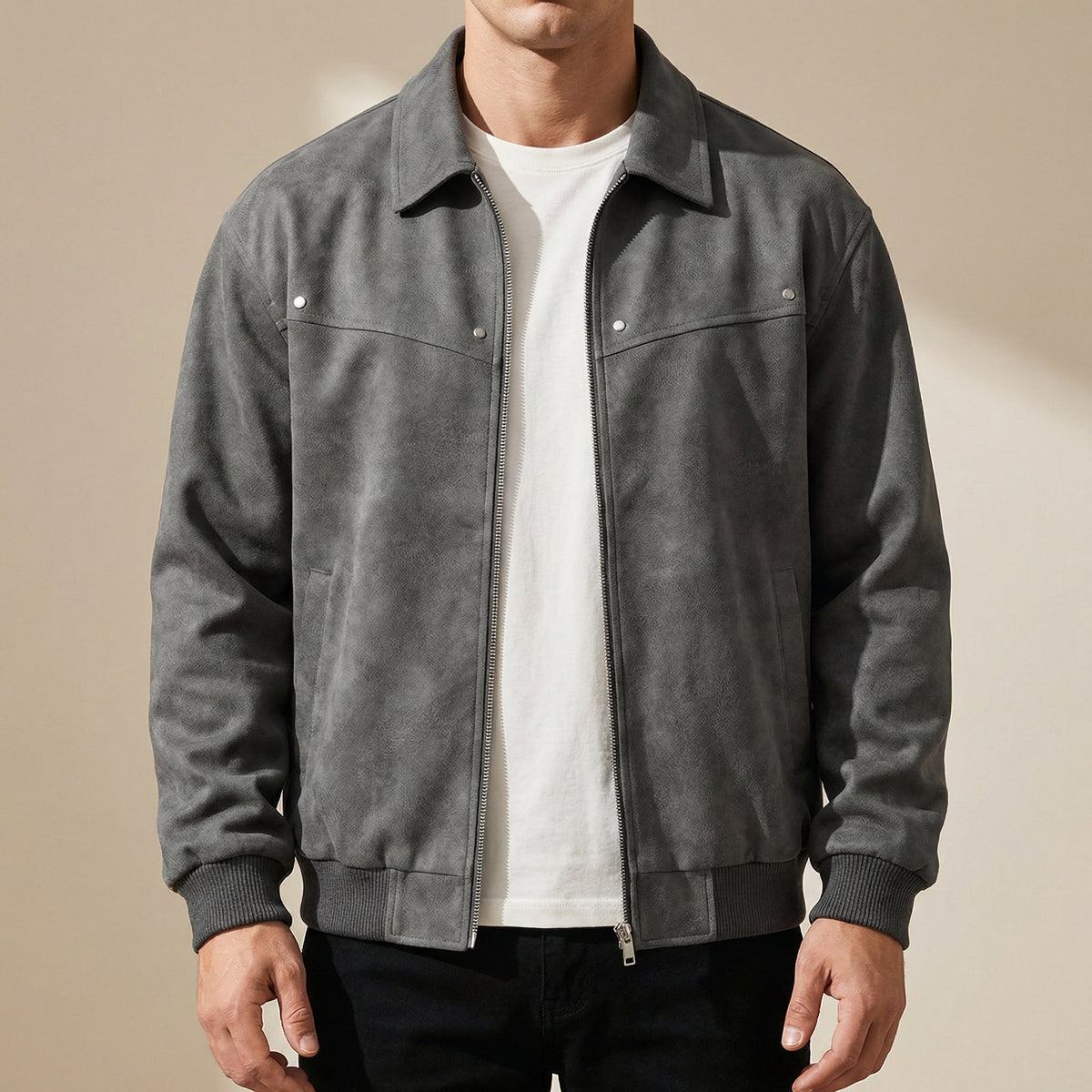 Men's lambskin leather jacket in charcoal gray, pointed collar, front zipper, snap chest pockets.