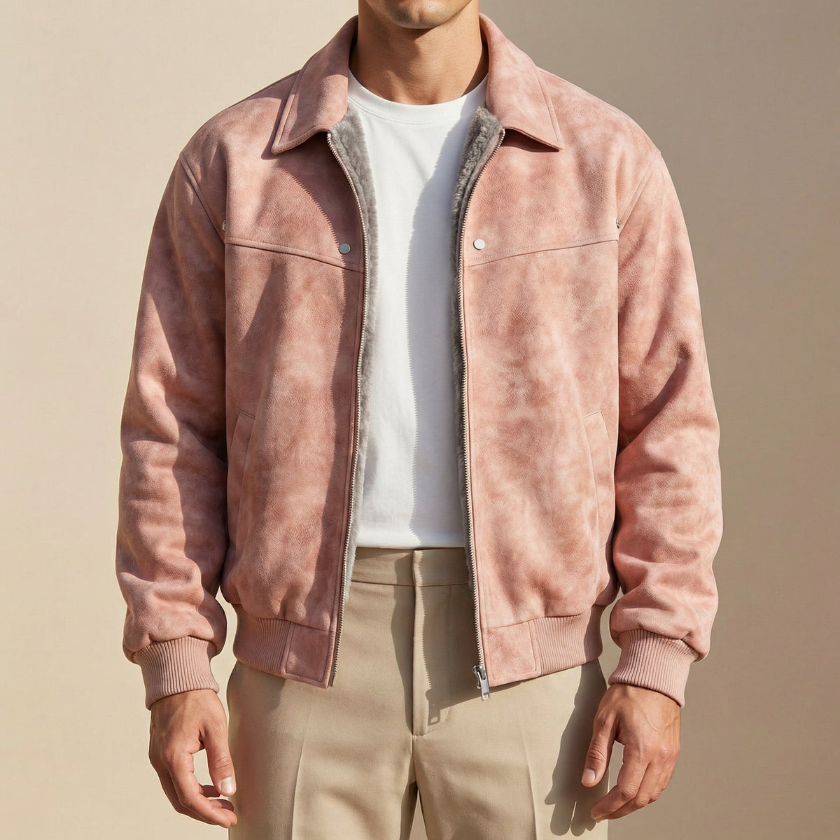 Men's lambskin leather jacket in dusty pink, stand collar, front zip, snap chest pockets, ribbed cuffs.