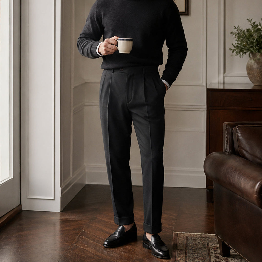 Men’s black dress pants with pleated front and tapered leg, classic fit
