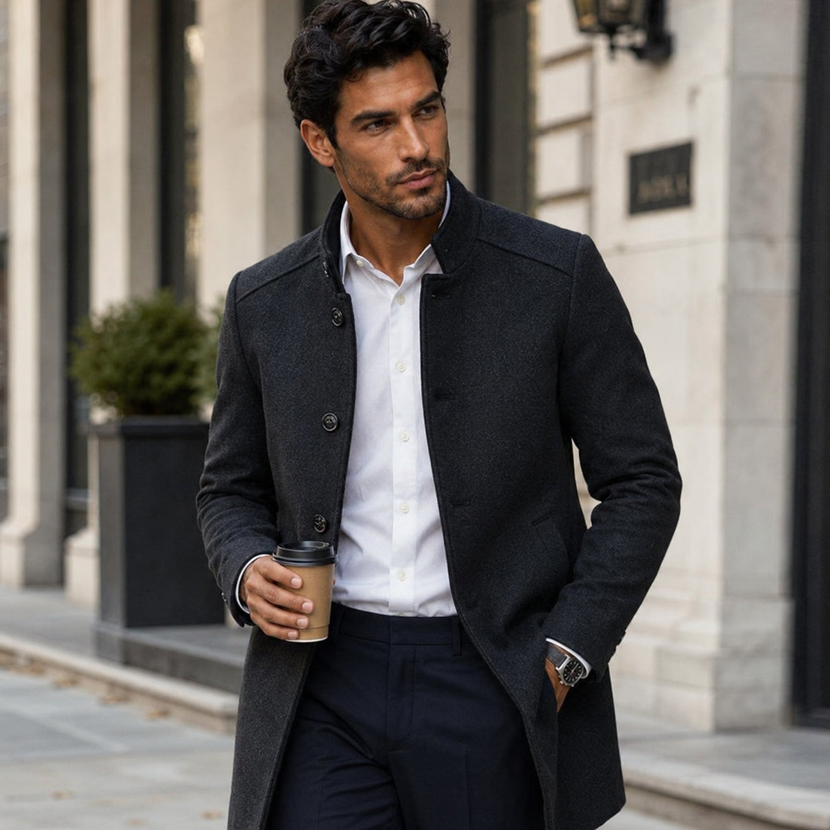 Men's dark wool overcoat, long button-front coat with notch lapels and side pockets.