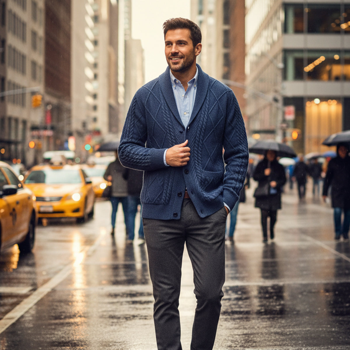 Men's blue wool button cardigan with shawl collar, worn over a light shirt