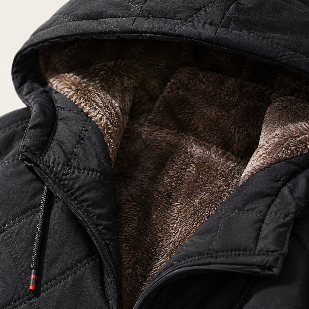 Black quilted puffer jacket with fleece lining visible at open front