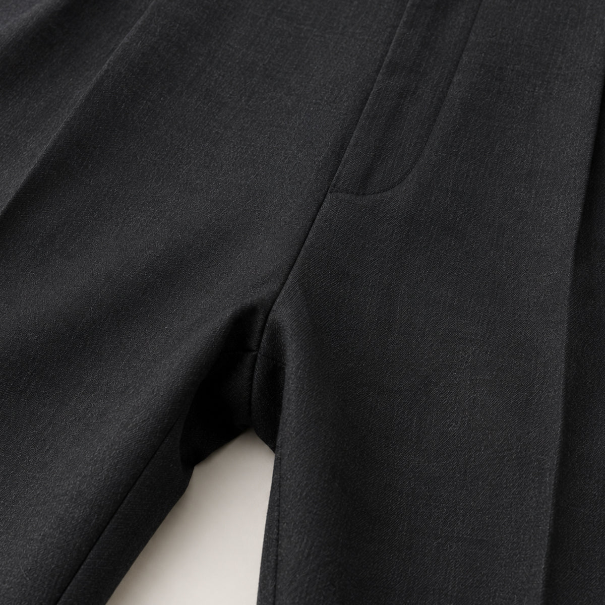 Men's black pleated straight pants with side seam and tailored fabric texture