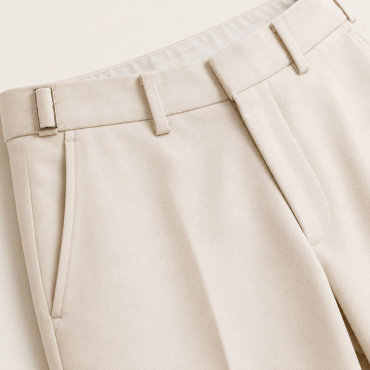 Men's beige trousers with belt loops and flat-front waistband