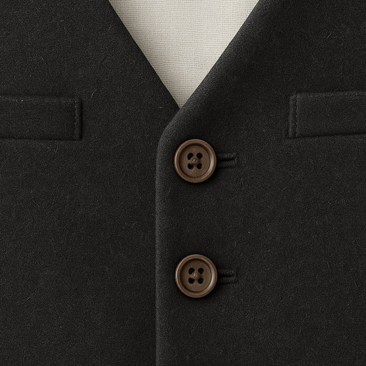 Men's black vest buttons detail with four decorative round front buttons