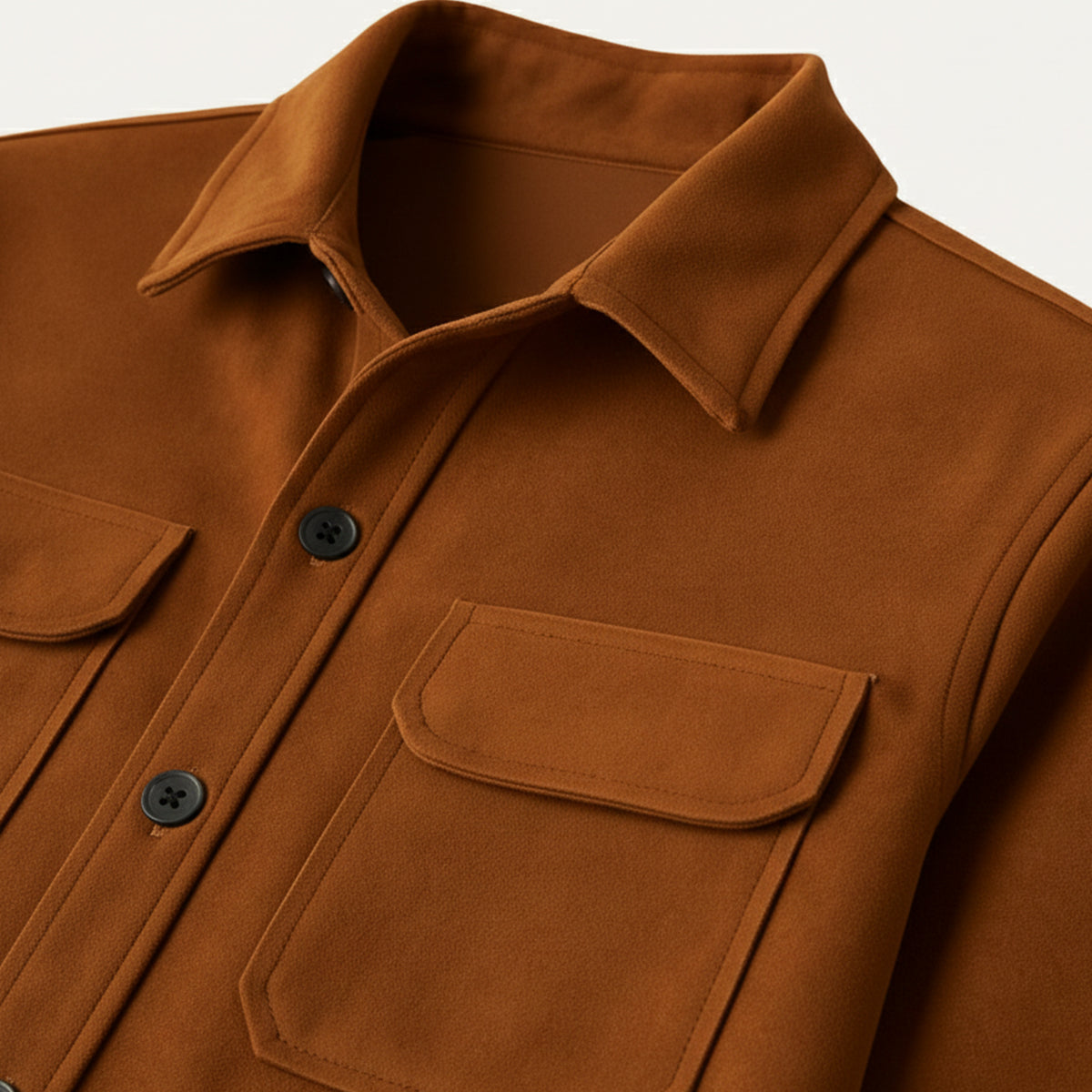 Camel overshirt close-up with point collar, black buttons, and chest flap pocket
