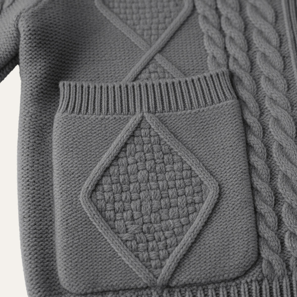 Gray cardigan pocket and knit detail with diamond cable stitch