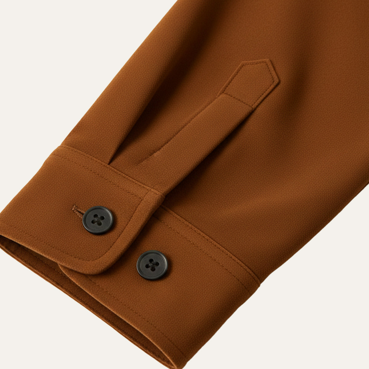 Camel overshirt cuff detail with button tabs and contrast stitching