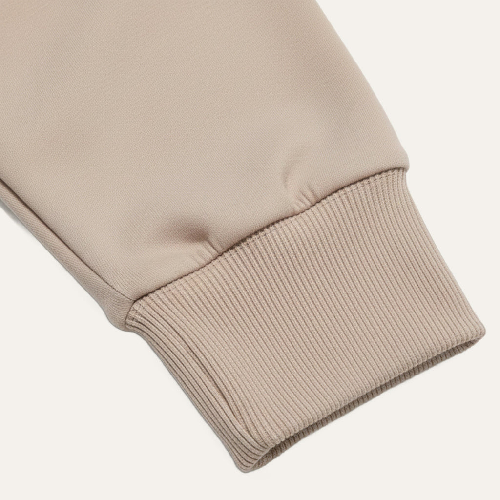 Khaki long-sleeve knit polo sleeve cuff with ribbed hem detail