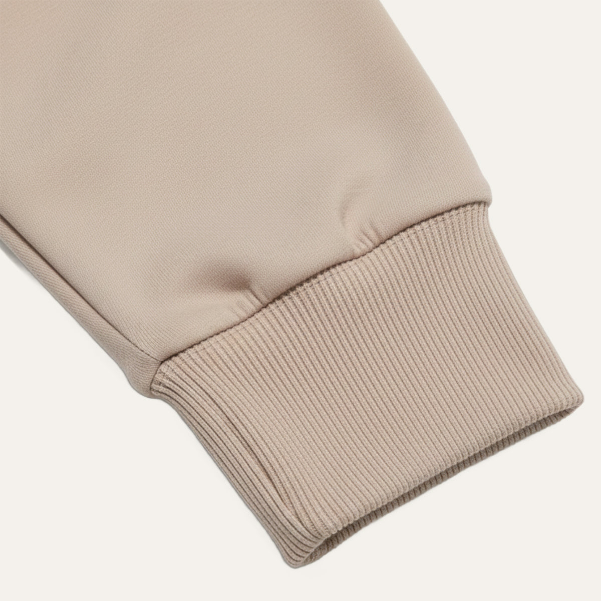 Khaki long-sleeve knit polo sleeve cuff with ribbed hem detail