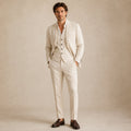 Men's beige 3-piece suit set on model: blazer, vest, and matching trousers