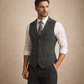 Men's dark gray tweed suit vest with notch lapels and four-button front, side pockets