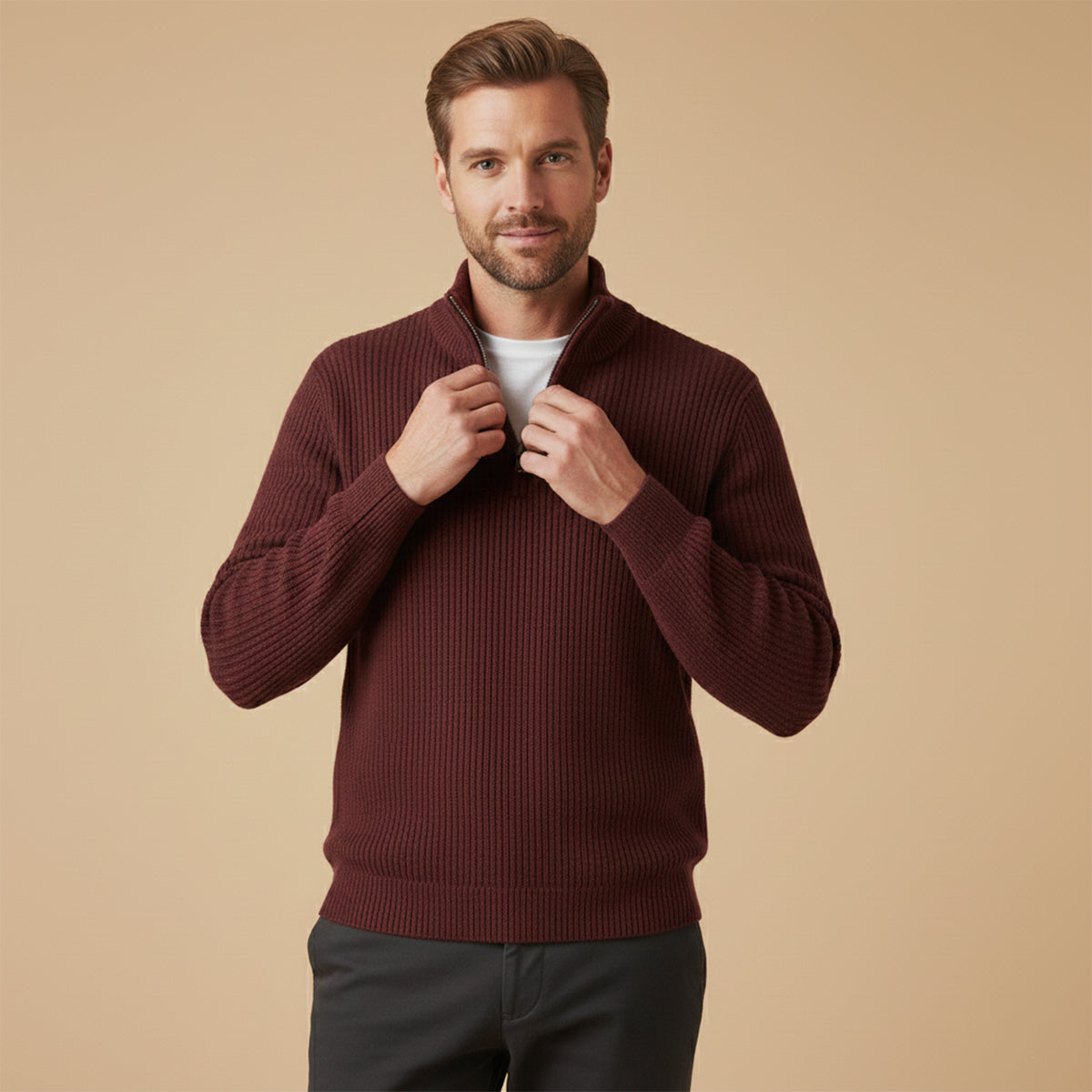 Men's burgundy half-zip cashmere sweater with ribbed knit texture and collar
