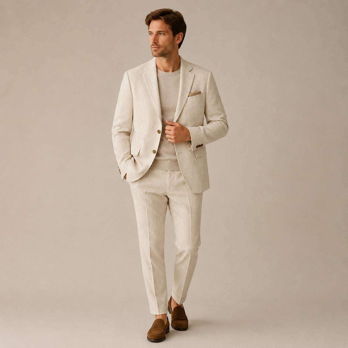 Beige slim fit business suit set on model, blazer and tapered trousers