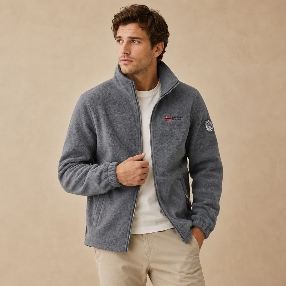Men's gray fleece-lined outdoor jacket with stand collar and zip pockets