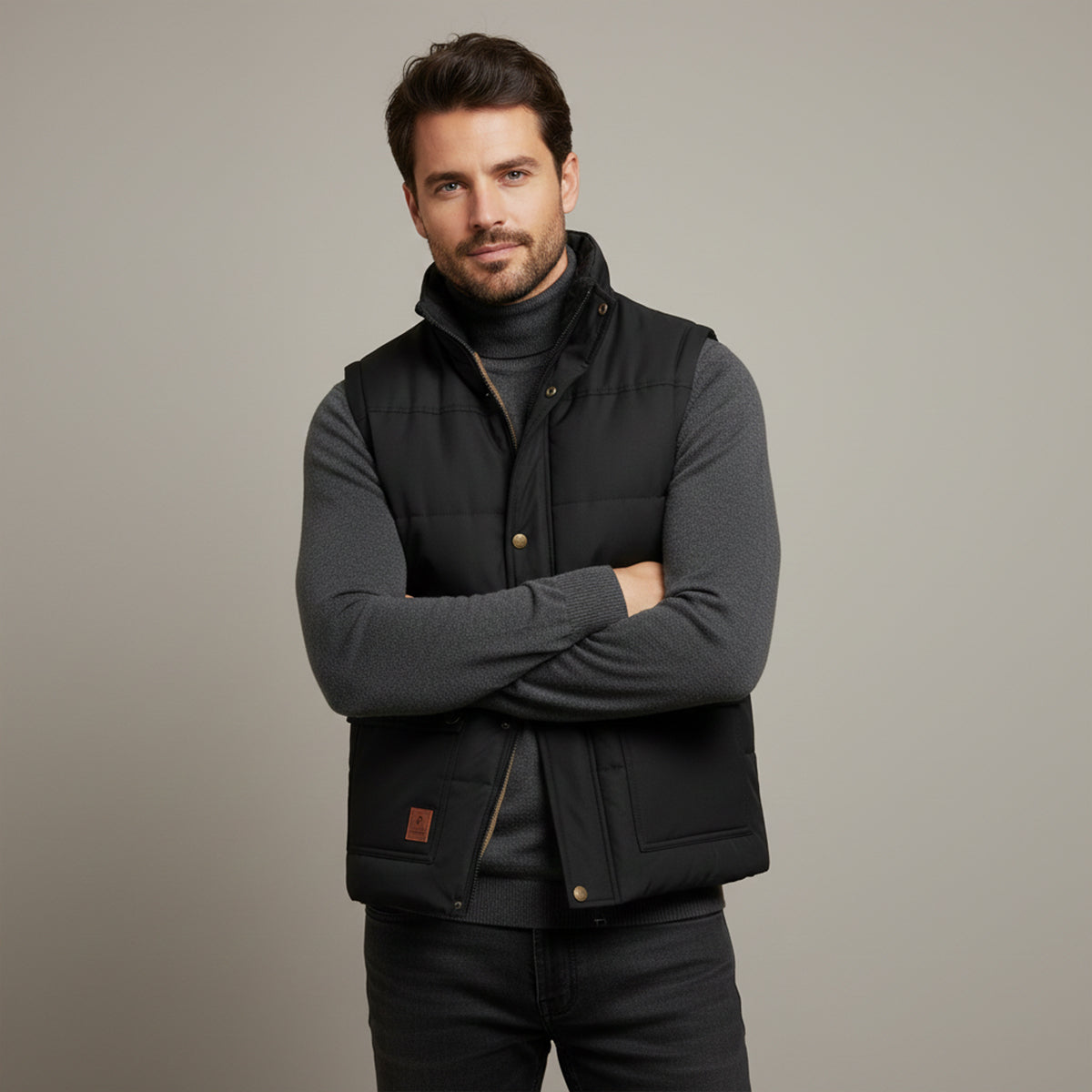 Men's black fleece-lined winter vest worn over a long-sleeve shirt, button front and pockets